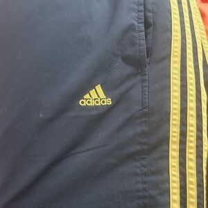 Adidas Black Pants with Yellow Stripes